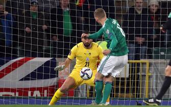 Northern Ireland's George Saville has a shot saved by Italy goalkeeper Gianluigi Donnarumma during the FIFA World Cup Qualifying match at Windsor Park, Belfast. Picture date: Monday November 15, 2021. (Photo by Liam McBurney/PA Images via Getty Images)