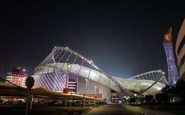 DOHA, QATAR - 05 OCTOBER: An exterior general view of the Khalifa International Stadium, also known as National Stadium as part of the Doha Sports City complex with the Aspire Tower, a host venue for the Qatar 2022 FIFA World Cup on October 5, 2021 in Doha Qatar. (Photo by Matthew Ashton - AMA/Getty Images)