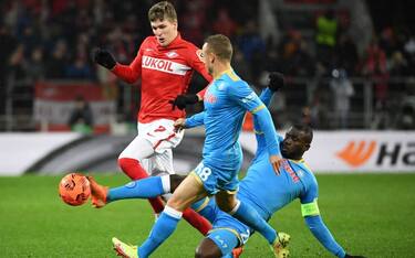 Spartak Moscow's Russian striker Aleksandr Sobolev, Napoli's Slovakian midfielder Stanislav Lobotka and Napoli's Senegalese defender Kalidou Koulibaly vie for the ball during the UEFA Europa League football match between Spartak Moscow and Napoli at Moscow's Spartak Stadium on November 24, 2021. (Photo by Natalia KOLESNIKOVA / AFP) (Photo by NATALIA KOLESNIKOVA/AFP via Getty Images)