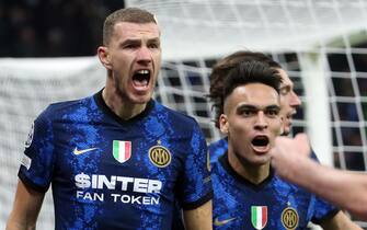 Inter Milan s Edin Dzeko (L) jubilates with his teammate Lautaro Martinez after scoring goal of 1 to 0 during he UEFA Champions League group  D soccer match between FC Inter  and Shakhtar Donetsk  at Giuseppe Meazza stadium in Milan, 24 November 2021.ANSA / MATTEO BAZZI