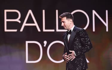Paris Saint-Germain's Argentine forward Lionel Messi arrives to deliver a speech after being awarded the   Ballon d'Or award   during the 2021 Ballon d'Or France Football award ceremony at the Theatre du Chatelet in Paris on November 29, 2021. (Photo by FRANCK FIFE / AFP) (Photo by FRANCK FIFE/AFP via Getty Images)