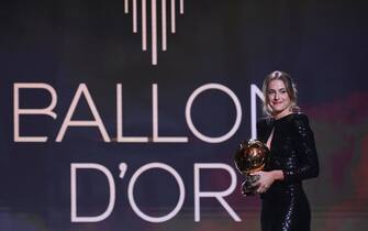 FC Barcelona's Spanish midfielder Alexia Putellas reacts after being awarded the the women's Ballon d'Or award  during the 2021 Ballon d'Or France Football award ceremony at the Theatre du Chatelet in Paris on November 29, 2021. (Photo by FRANCK FIFE / AFP) (Photo by FRANCK FIFE/AFP via Getty Images)