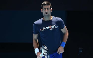 epa09679656 Novak Djokovic of Serbia is seen during a training session at Melbourne Park in Melbourne, Australia, 12 January 2022.  EPA/JAMES ROSS  AUSTRALIA AND NEW ZEALAND OUT