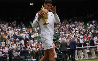 (210712) -- LONDON, July 12, 2021 (Xinhua) -- Novak Djokovic of Serbia celebrates with the trophy after winning the men's final match between Novak Djokovic of Serbia and Matteo Berrettini of Italy at Wimbledon tennis Championship in London, Britain, on July 11, 2021. (Photo by Tim Ireland/Xinhua) - Tim Ireland -//CHINENOUVELLE_CHINE011574/2107120843/Credit:CHINE NOUVELLE/SIPA/2107120845