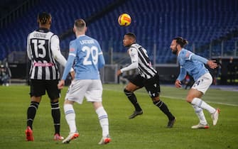 Udinese's Destiny Udogie, Lazio's Manuel Lazzari, Udinese's Marvin Zeegelaar and Lazio s Vedat Muriqi, during the Italian Cup Round of 16 soccer match between Lazio and Udinese at the Olimpico stadium in Rome, 18 January 2022. ANSA/FABIO FRUSTACI