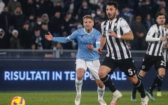Lazio s Ciro Immobile, Udinese's Tolgay Arslan during the Italian Cup Round of 16 soccer match between Lazio and Udinese at the Olimpico stadium in Rome, 18 January 2022. ANSA/FABIO FRUSTACI