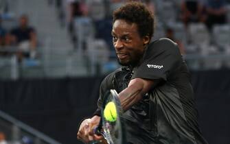 AUSTRALIA TENNIS AUSTRALIAN OPEN GRAND SLAM epa09703792 Gael Monfils of France in action against Miomir Kecmanovic of Serbia during the fourth round match at the Australian Open Grand Slam tennis tournament in Melbourne, Australia, 23 January 2022. EPA/JASON O'BRIEN