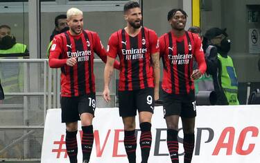 AC Milan's Olivier Giroud (C) jubilates with his teammates  Theo Hernandez (L) and  Rafael Leao after scoring goal of 3 to 0 during  the Italian Cup quarterfinal  soccer match between AC Milan and Lazio  at Giuseppe Meazza stadium in Milan, 9 February 2022.
ANSA / MATTEO BAZZI

