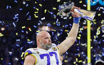 epa09754594 Los Angeles Rams offensive tackle Andrew Whitworth holds up the Vince Lombardi Trophy after the Los Angeles Rams defeated the Cincinnati Bengals to win Super Bowl LVI at SoFi Stadium in Inglewood, California, USA, 13 February 2022. The annual Super Bowl is the Championship game of the NFL between the AFC Champion and the NFC Champion and has been held every year since January of 1967.  EPA/JOHN G. MABANGLO