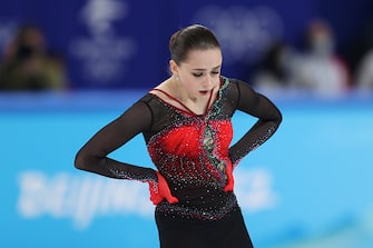 BEIJING, CHINA - FEBRUARY 17: Kamila Valieva of Team ROC reacts after skating during the Women Single Skating Free Skating on day thirteen of the Beijing 2022 Winter Olympic Games at Capital Indoor Stadium on February 17, 2022 in Beijing, China. (Photo by Catherine Ivill/Getty Images)