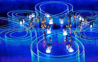 epa09774070 Dancers hold Snowflake Lanterns during the Closing Ceremony for the Beijing 2022 Olympic Games at the National Stadium, also known as Bird's Nest, in Beijing China, 20 February 2022.  EPA/HOW HWEE YOUNG