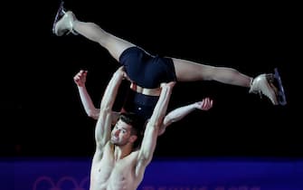 epa09773769 Nicole Della Monica (top) and Matteo Guarise (bottom) of Italy perform during the Figure Skating Gala at the Beijing 2022 Olympic Games, Beijing, China, 20 February 2022.  EPA/HOW HWEE YOUNG