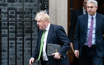 Prime Minister, Boris Johnson leaves 10 Downing Street in London followed by his Chief of Staff, Stephen Barclay after chairing a meeting of the Government's Cobra emergency committee to discuss latest developments regarding Ukraine. Picture date: Tuesday February 22, 2022.