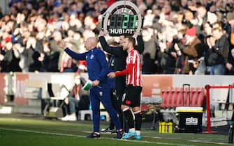 Brentford's Christian Eriksen (centre) comes on to make his debut during the Premier League match at the Brentford Community Stadium, London. Picture date: Saturday February 26, 2022. (Photo by Aaron Chown/PA Images via Getty Images)