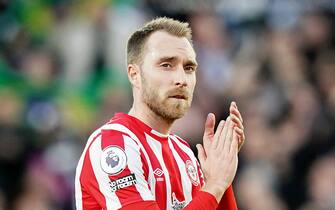 Brentford's Christian Eriksen applauds the fans after the final whistle of the Premier League match at the Brentford Community Stadium, London. Picture date: Saturday February 26, 2022. (Photo by Aaron Chown/PA Images via Getty Images)