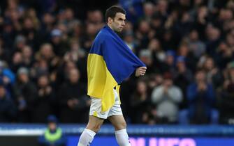 Liverpool, England, 26th February 2022. Seamus Coleman of Everton takes to the pitch draped in the Ukraine flag during the Premier League match at Goodison Park, Liverpool. Picture credit should read: Darren Staples / Sportimage via PA Images