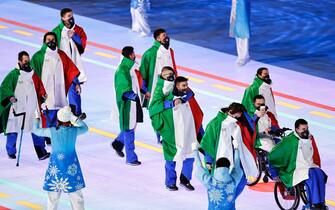 BEIJING, CHINA - MARCH 04: Members of Team Italy wave look on during the Opening Ceremony of the Beijing 2022 Winter Paralympics at the Beijing National Stadium on March 04, 2022 in Beijing, China. (Photo by Wang He/Getty Images for International Paralympic Committee)