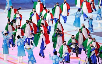 BEIJING, CHINA - MARCH 04: Members of Team Italy wave during the Opening Ceremony of the Beijing 2022 Winter Paralympics at the Beijing National Stadium on March 04, 2022 in Beijing, China. (Photo by Wang He/Getty Images for International Paralympic Committee)