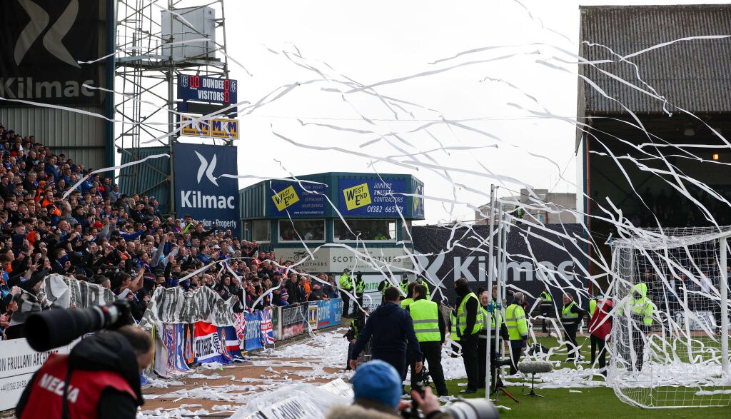 DUNDEE, SCOTLAND - MARCH 20: Rangers fans throw streamers on to the pitch in protest at a proposed Old Firm friendly in Australia during a cinch Premiership match between Dundee and Rangers at the Kilmac Stadium at Dens Park, on March 20, 2022, in Dundee, Scotland.  (Photo by Alan Harvey/SNS Group via Getty Images)
