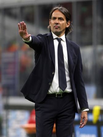 Inter Milan s coach Simone Inzaghi gestures during the Italy Cup semifinal second leg soccer match between Fc Inter  and Ac Milan at Giuseppe Meazza stadium in Milan, Italy, 19 April 2022.ANSA / MATTEO BAZZI