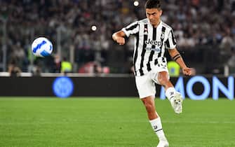 Juventus' Argentine forward Paulo Dybala shoots on target during the Italian Cup (Coppa Italia) final football match between Juventus and Inter on May 11, 2022 at the Olympic stadium in Rome. (Photo by Isabella BONOTTO / AFP) (Photo by ISABELLA BONOTTO/AFP via Getty Images)