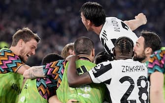 Juventus' players celebrates after Juventus scored an equalizer during the Italian Cup (Coppa Italia) final football match between Juventus and Inter on May 11, 2022 at the Olympic stadium in Rome. (Photo by Filippo MONTEFORTE / AFP) (Photo by FILIPPO MONTEFORTE/AFP via Getty Images)