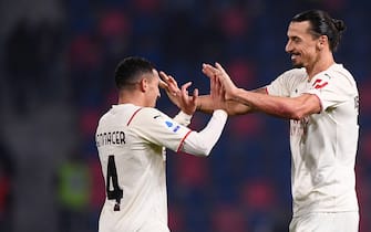 BOLOGNA, ITALY - October 23, 2021: Zlatan Ibrahimovic (R) of AC Milan celebrates with Ismael Bennacer of AC Milan after scoring a goal during the Serie A football match between Bologna FC and AC Milan. (Photo by Nicolò Campo/Sipa USA)