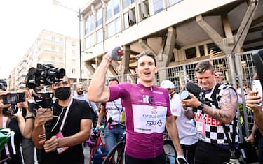 Team Groupama-FDJ's French rider Arnaud Demare celebrates after crossing the finish line to win the 13th stage of the Giro d'Italia 2022 cycling race, 150 kilometers from San Remo to Cuneo, northwestern Italy, on May 20, 2022. (Photo by Fabio FERRARI / POOL / AFP) (Photo by FABIO FERRARI/POOL/AFP via Getty Images)