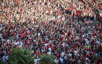 AC Milan's supporters celebrate the victory of the Italian Serie A Championship ( Scudetto") in the centre of Milan, Italy, 23 May 2022.ANSA/MATTEO CORNER