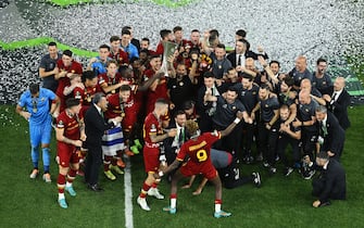 TIRANA, ALBANIA - MAY 25: Lorenzo Pellegrini of AS Roma lifts the UEFA Europa Conference League Trophy after their sides victory during the UEFA Conference League final match between AS Roma and Feyenoord at Arena Kombetare on May 25, 2022 in Tirana, Albania. (Photo by Chris Ricco - UEFA/UEFA via Getty Images)