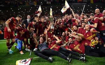 TIRANA, ALBANIA - MAY 25: Lorenzo Pellegrini of AS Roma lifts the UEFA Europa Conference League Trophy after their sides victory during the UEFA Conference League final match between AS Roma and Feyenoord at Arena Kombetare on May 25, 2022 in Tirana, Albania. (Photo by Valerio Pennicino - UEFA/UEFA via Getty Images)
