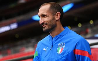 LONDON, ENGLAND - MAY 31: Giorgio Chiellini of Italy enters the pitch to warm up prior to the Italy Training Session at Wembley Stadium on May 31, 2022 in London, England. (Photo by Michael Regan - UEFA/UEFA via Getty Images)