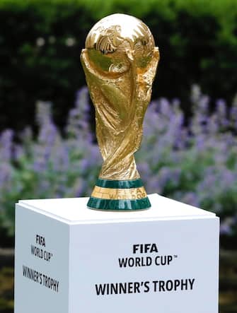 epa10017338 The FIFA 2026 World Cup trophy is displayed, at Radio City, in New York, New York, USA, 16 June 2022.The North American cities hosting the 2026 World Cup were announced, eleven sites are in the US, three are in Mexico, and two in Canada.  EPA/Peter Foley