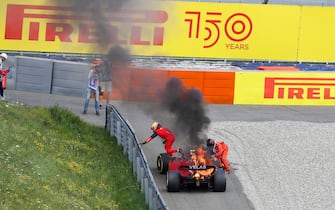 Car of #55 Carlos Sainz (ESP, Scuderia Ferrari) on fire, F1 Grand Prix of Austria at Red Bull Ring on July 10, 2022 in Spielberg, Austria. (Photo by HIGH TWO)