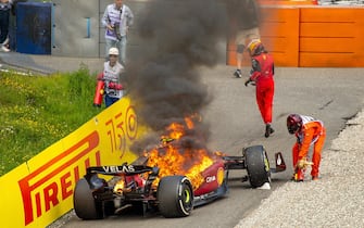 07/10/2022, Red Bull Ring , Spielberg, Formula 1 BWT Grand Prix of Austria 2022 , in the picture Carlos Sainz Jr. (ESP), Scuderia Ferrari gets out of his burning Ferrari.