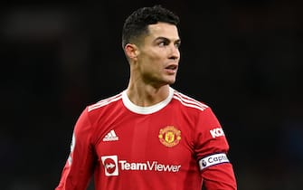 MANCHESTER, ENGLAND - JANUARY 03: Cristiano Ronaldo of Manchester United reacts wearing the captains armband during the Premier League match between Manchester United and Wolverhampton Wanderers at Old Trafford on January 03, 2022 in Manchester, England. (Photo by Gareth Copley/Getty Images)