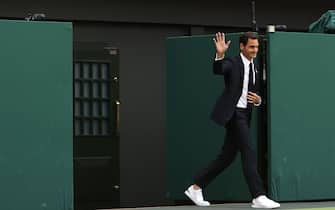 LONDON, ENGLAND - JULY 03: Roger Federer of Switzerland walks onto court during the Centre Court Centenary Celebration during day seven of The Championships Wimbledon 2022 at All England Lawn Tennis and Croquet Club on July 03, 2022 in London, England. (Photo by Ryan Pierse/Getty Images)