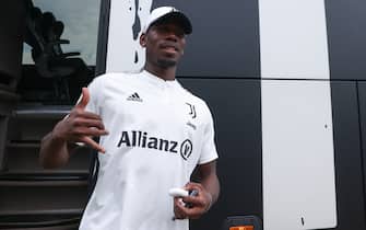 VILLAR PEROSA, ITALY - AUGUST 04: Paul Pogba of Juventus exits the team bus upon arrival for the Pre-season Friendly match between Juventus A and Juventus B at Campo Comunale Gaetano Scirea on August 04, 2022 in Villar Perosa, Italy. (Photo by Jonathan Moscrop/Getty Images)