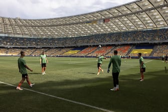 epa10134442 Players of Shakhtar Donetsk warm up before the opening soccer match of the new season of Ukrainian Premier League between Shakhtar Donetsk and Metalist 1925 Kharkiv at the empty Olimpiyskiy stadium, in Kyiv, Ukraine, 23 August 2022. Ukrainian football Premier League began its new season on 23 August with out fans amid fears of bombs annd missiles alerts, a day before six months of the Russian invasion are marked. Russian troops on 24 February 2022 entered Ukrainian territory, starting a conflict that provoked destruction and a humanitarian crisis.  EPA/ROMAN PILIPEY