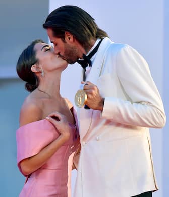 Gianmarco Tamberi and Chiara Bontempi (L) arrive for the premiere of 'Qui rido io' during the 78th annual Venice International Film Festival,in Venice,Italy, 07 September 2021. The movie is presented in Official competition 'Venezia 78' at the festival running from 01 to 11 September. ANSA/ETTORE FERRARI