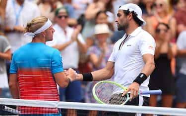NEW YORK, NEW YORK - SEPTEMBER 04: Matteo Berrettini of Italy, right, shakes hands with Alejandro Davidovich Fokina of Spain  after winning their Men's Singles Fourth Round match on Day Seven of the 2022 US Open at USTA Billie Jean King National Tennis Center on September 04, 2022 in the Flushing neighborhood of the Queens borough of New York City. (Photo by Mike Stobe/Getty Images)