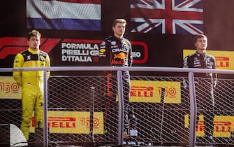 MONZA - (VLNR) Charles Leclerc (Ferrari), Max Verstappen (Oracle Red Bull Racing) and George Russell (Mercedes) on the podium after the F1 Grand Prix of Italy at the Monza Circuit in Monza, Italy. REMKO DE WAAL /ANP/Sipa USA