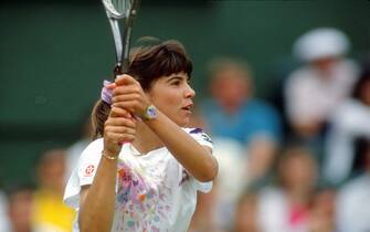 LONDON - CIRCA 1990:  Jennifer Capriati of the United States hits a return during a women's singles match at the Wimbledon Lawn Tennis Championships circa 1990 at the All England Lawn Tennis and Croquet Club in London, England. (Photo by Focus on Sport/Getty Images) *** Local Caption *** Jennifer Capriati