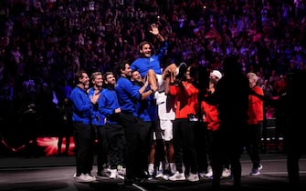 Team Europe's Roger Federer is lifted up by both teams after his final competitive match on day one of the Laver Cup at the O2 Arena, London. Picture date: Friday September 23, 2022.
