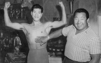 1301362831 JAPAN: In this undated picture, Rikidozan and Antonio Inoki are seen circa 1960 in Japan. (Photo by Sports Nippon/Getty Images)