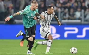 Juventus’ Angel Di Maria and Maccabi Haifa’s Pierre Cornud in action during the uefa champions league group stage soccer match Juventus FC vs Maccabi Haifa FC at the Allianz Stadium in Turin, Italy, 5 october 2022 ANSA/ALESSANDRO DI MARCO