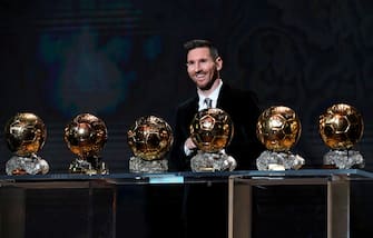 PARIS, FRANCE - DECEMBER 02: Lionel Messi (ARG / FC Barcelona) poses onstage after winning his sixth Ballon D'Or award during the Ballon D'Or Ceremony at Theatre Du Chatelet on December 02, 2019 in Paris, France. (Photo by Kristy Sparow/Getty Images)