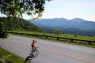 ROANOKE, VIRGINIA - JUNE 05: Athletes compete in the cycling phase of the IRONMAN 70.3 Virginia's Blue Ridge on June 05, 2022 in Roanoke, Virginia. (Photo by Mike Mulholland/Getty Images for IRONMAN)