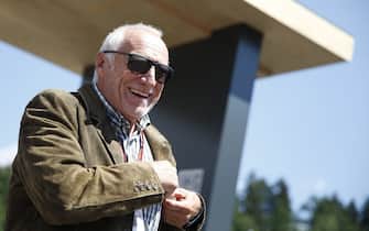 Red Bull CEO Austrian Dietrich Mateschitz arrives in the paddocks ahead of the Austrian Formula One Grand Prix in Spielberg, central Austria, on July 1, 2018. - Austria OUT (Photo by ERWIN SCHERIAU / APA / AFP) / Austria OUT (Photo by ERWIN SCHERIAU/APA/AFP via Getty Images)