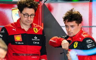 epa09930679 Monaco's Formula One driver Charles Leclerc of Scuderia Ferrari talks with Scuderia Ferrari team principal Mattia Binotto following Free Practice 1 of the Formula One Grand Prix of Miami at the Miami International Autodrome in Miami, USA, 06 May 2022.  EPA/SHAWN THEW